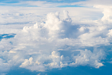 blue sky with a clouds. Clear blue sky panoramic background with small white clouds. Partly cloudy. White fluffy clouds in the blue sky.