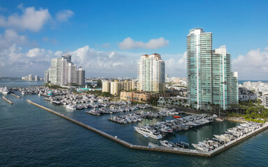 Luxury yachting in summer. Docked yacht in port of Miami. Marina luxury cityscape. Port with yacht. Yachting marina. Luxury yacht charter. Miami port marina