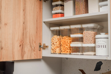 Organized Kitchen Pantry with Clear Food Storage Containers