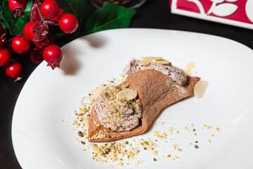 Italian cannoli dessert with ricotta filling.