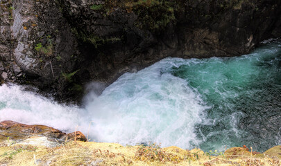 Small river with natural spring waterfall in a wood. British Columbia, Canada