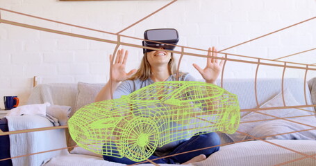 Image of 3d technical drawing of car, over woman at home wearing vr headset