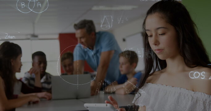 Image of mathematical equations over schoolchildren learning