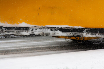 Close up shot of scoop on snow plough on a snowy icy winters day in Shrewsbury Shropshire UK.