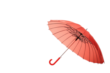 A vibrant red umbrella stands out beautifully against a minimalist white background