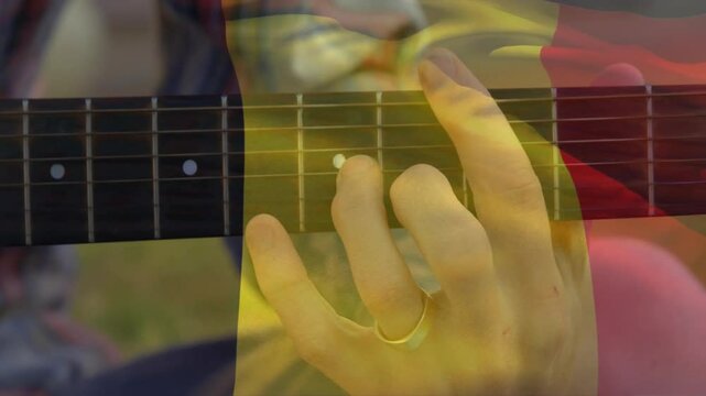 Playing guitar chords, fingers moving over colorful animation shapes in school