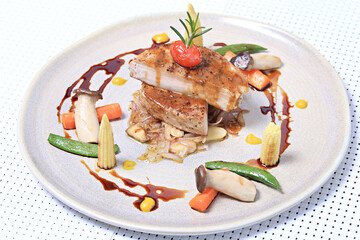 Kurobuta Pork Steak, Pork meat grilled with fresh vegetable salad decorate on a white plate