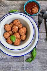 Mini pork meatballs with salsa filling.
 Party fingerfood. Diet  ketogenic food.