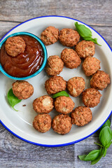 Mini pork meatballs with salsa filling.
 Party fingerfood. Diet  ketogenic food.