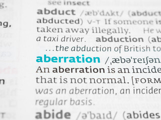 Exploring the definition of aberration and usage in various contexts as a deviation from the norm.