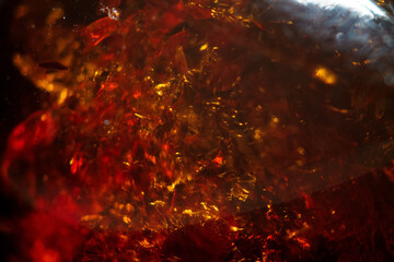 Amber in macro photography: amazing textures and warm color of stone, creating unique accents for jewelry and decor.
