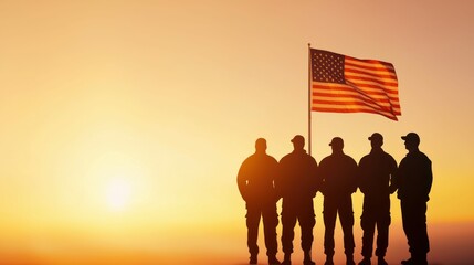 Fototapeta premium Silhouetted soldiers stand with an American flag during a beautiful sunset, symbolizing patriotism.
