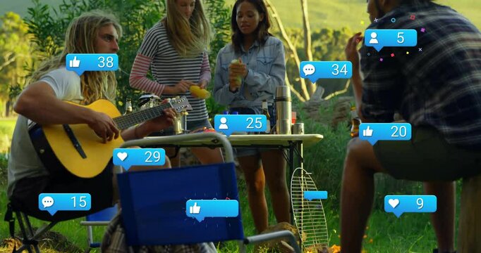 Friends at picnic with animation of social media icons in outdoor setting