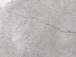 Abstract cracked grey concrete wall texture background