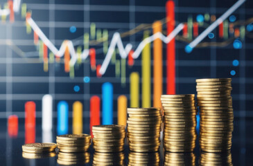 column of stacked gold coins against a dynamic financial graph, representing wealth and market performance.