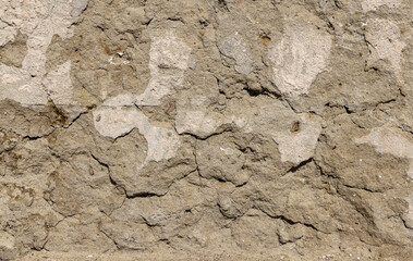 Close-up of old damaged plaster on a wall