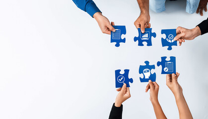 A dynamic scene showcasing diverse hands assembling blue puzzle pieces, each adorned with icons...