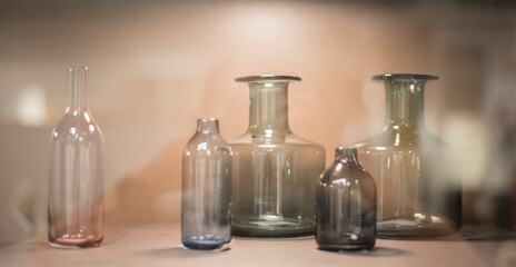 Vintage glass bottles in the museum, shallow depth of field.