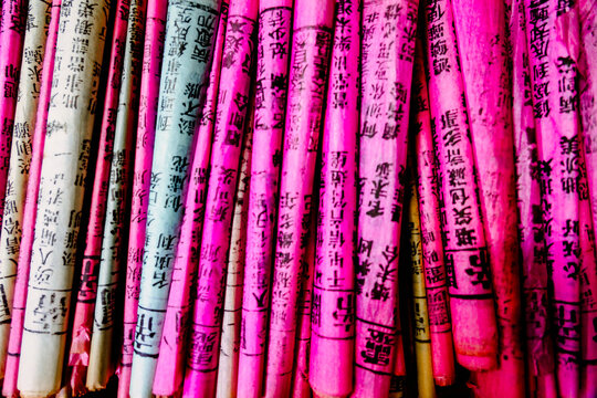 Colorful prayer incense sticks with Chinese inscriptions, Macau