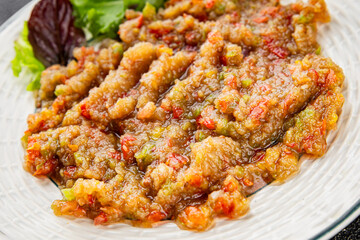 Eggplant dip aubergine salad Baba ganoush eggplant, tomato, onion vegetable dish fresh gourmet food background on table rustic food top view copy spac