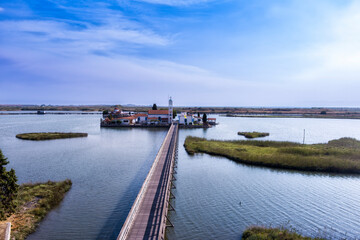 Fototapeta premium Aerial view od Agios Nikolaos Monastery on the Vistonida Lake at Porto Lagos, Greece