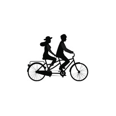 Fototapeta premium silhouette of a man riding a bike