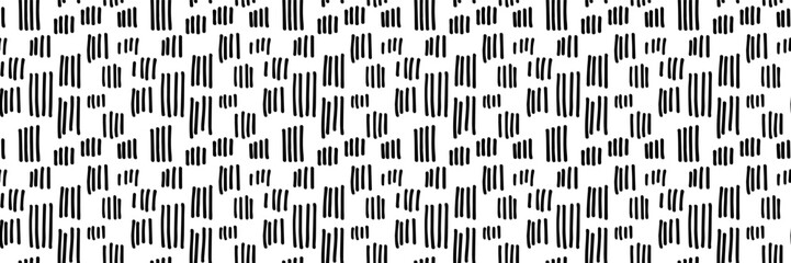 Small dash seamless pattern. Abstract black and white texture inspired by retro Memphis aesthetics. Perfect for branding, home decor, or digital designs. Vector illustration