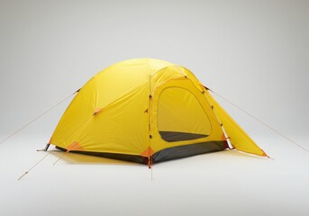 Isolated yellow camping tent with a dome shape on a white background outdoors