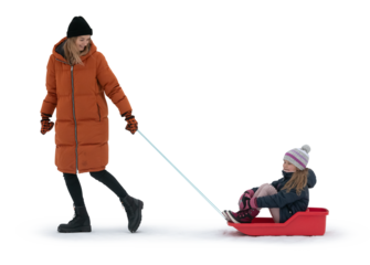 Woman pulling a sledge with her daughter sitting in it. Isolated on transparent background.