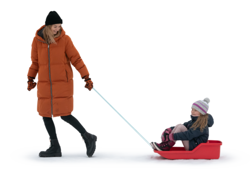 Woman pulling a sledge with her daughter sitting in it. Isolated on transparent background.