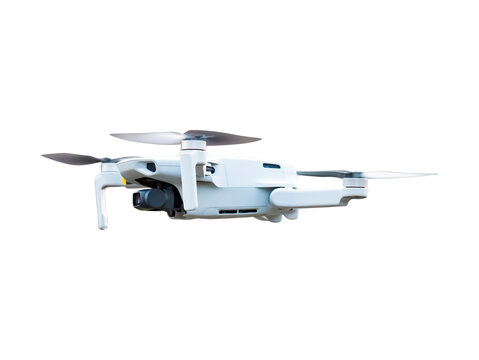 Drone in flight with working propellers. Quadcopter flying. Remotely controlled aircraft. Isolated without background. PNG image format. Photo for template. Insert into mockup. Suchaksny technologies.