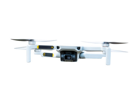 Drone in flight with working propellers. Quadcopter flying. Remotely controlled aircraft. Isolated without background. PNG image format. Photo for template. Insert into mockup. Suchaksny technologies.
