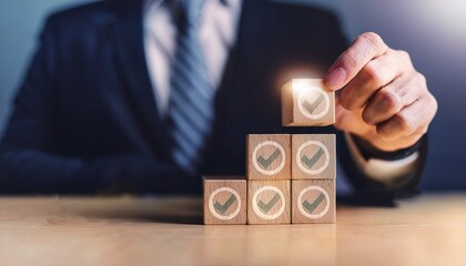 Building corporate governance structure. Businessman stacking wooden blocks. Check mark icon and lens flare light.