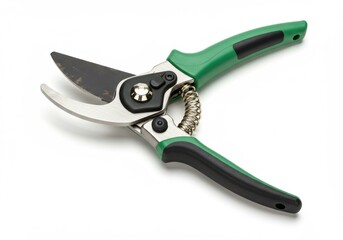 Obraz premium A close up of green handled pruning shears with silver blades on a white background surface view