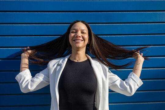 Confident Hispanic Business Woman Embracing Lifestyle
