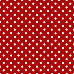 White polka dot pattern textured red background. Seamless polka dot pattern