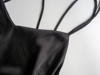 Women's black underwear on a white background close-up. Peignoir