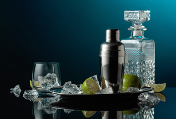 Shaker with crushed ice, lime and vodka.