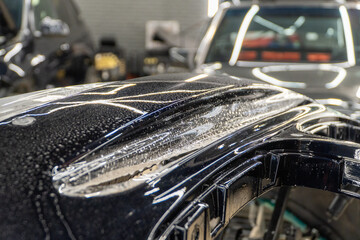 The process of installing PPF, armored film on the car. PPF is a polyurethane, protective film that...