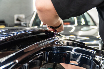 The process of installing PPF, armored film on the car. PPF is a polyurethane, protective film that...