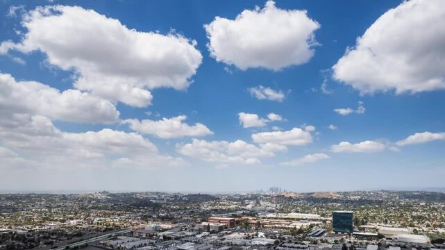 Downtown LA in the background time lapse large clouds drone up high hyper lapsed time lapse