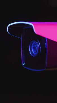 A Highly Visible and Vibrant Surveillance Camera Equipped with EyeCatching Neon Lighting