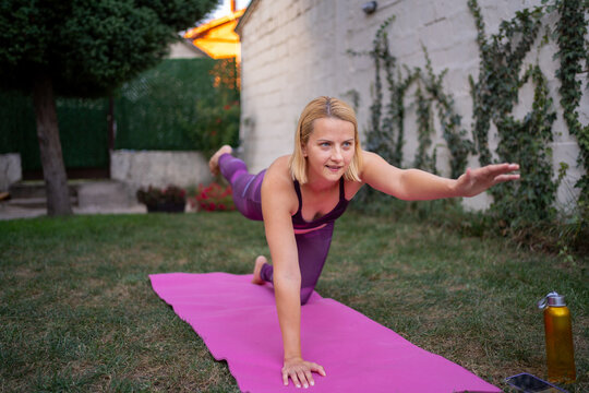 Mother exercises outdoors to regain strength and confidence after childbirth