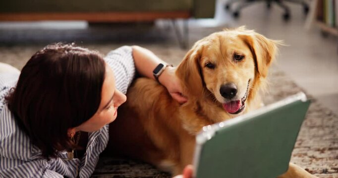 Relax, tablet and woman with dog in living room of home for bonding, reading or streaming. Love, smile or wellness with animal and happy pet owner on floor together for companionship or loyalty