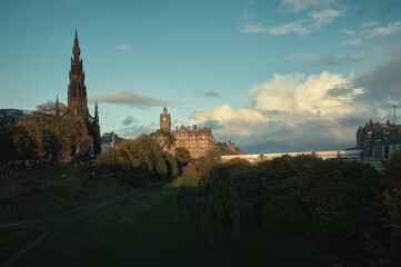 City Park and historic buildings in Edinburgh at sunset. Princes Street Gardens, Edinburgh, Scotland, United Kingdom