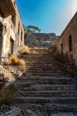 Abandoned Staircase in Sunlit Ruins