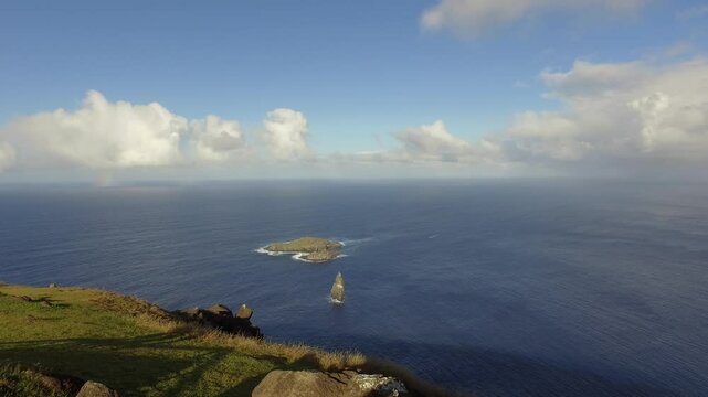 Explore the stunning landscapes of Easter Island and the volcanic site of Orongo featuring breathtaking ocean views