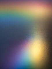 Fototapeta premium Blur colorful warm rainbow light leaks on black background vibrant rainbow over tranquil ocean at sunset nature beauty sea photography tranquility color image multi colored water. ai