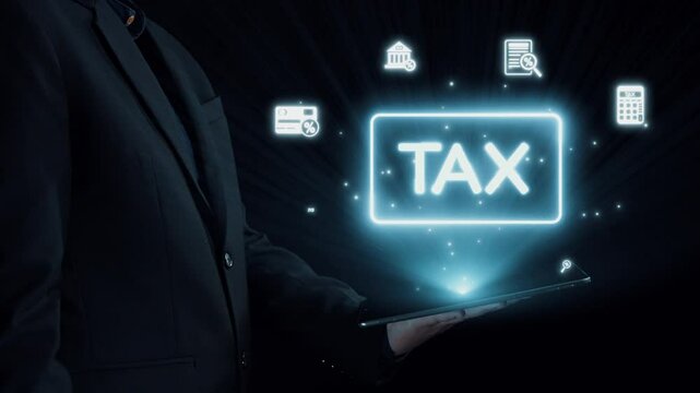 Businessman displays a tablet showcasing vibrant digital tax icons in a dark setting, symbolizing modern financial management and the importance of taxation in business. Qubit