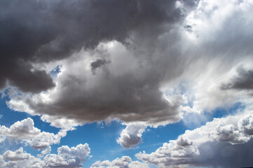 storm clouds in the blue sky